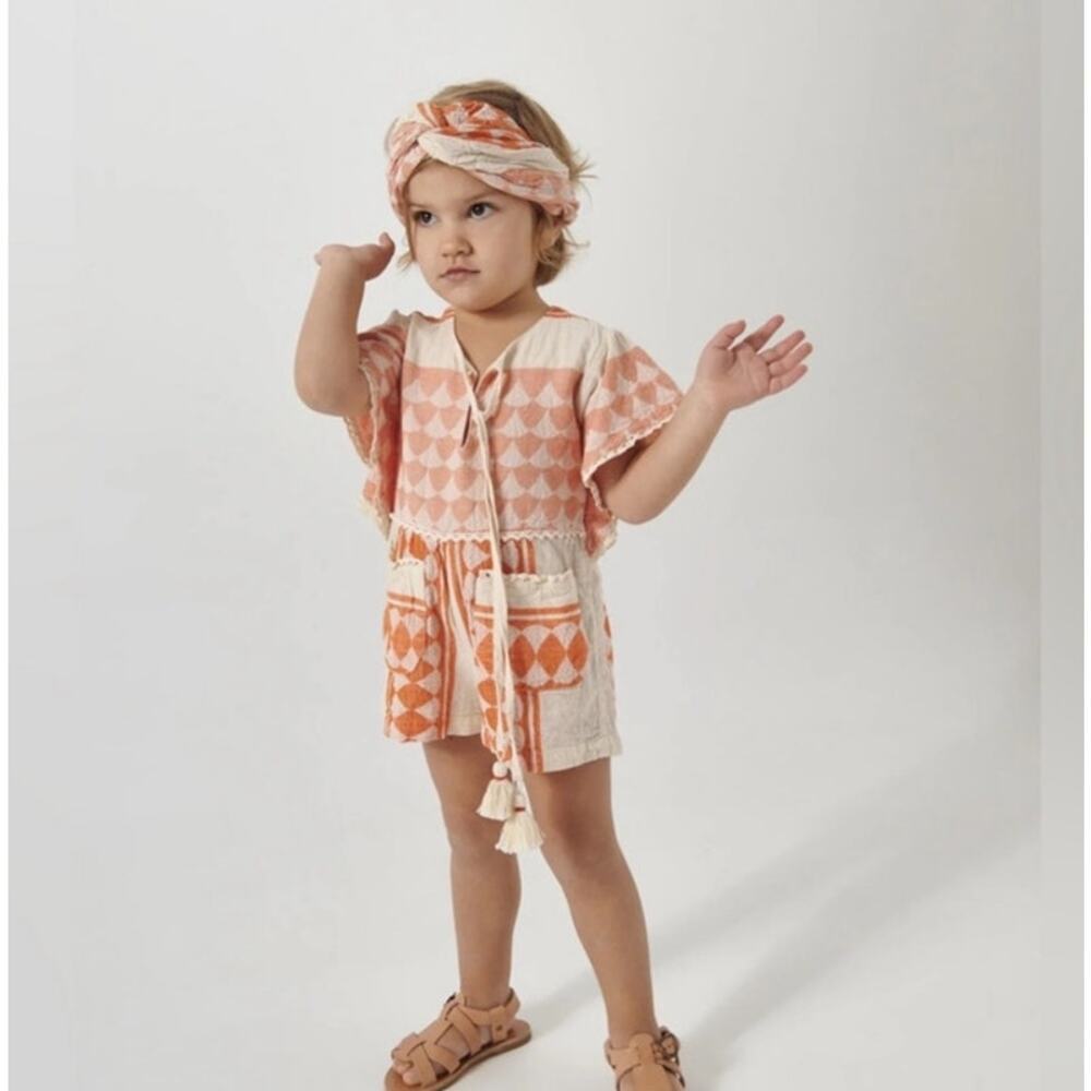 Pearl and Caviar Baby Girl Size 2/4 Apricot Zakar Romper Orange Tassel